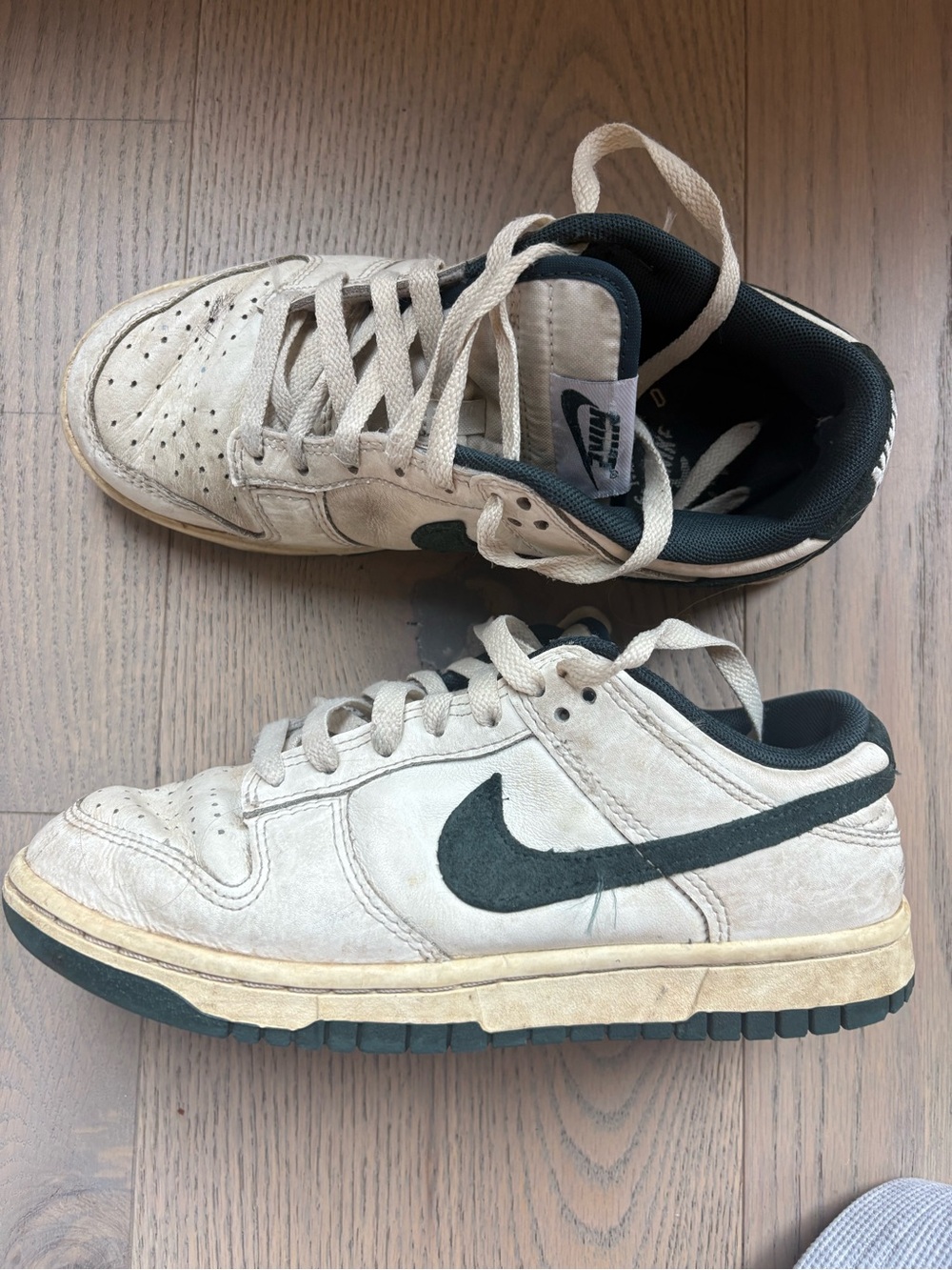 Women’s green and white low dunks